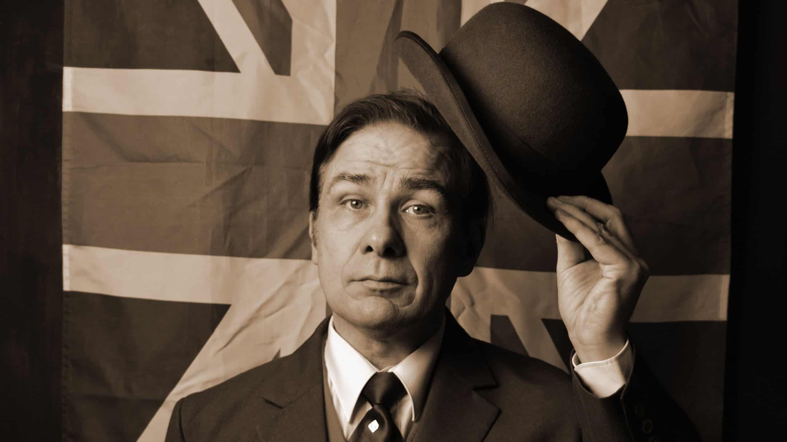 British man in blower hat