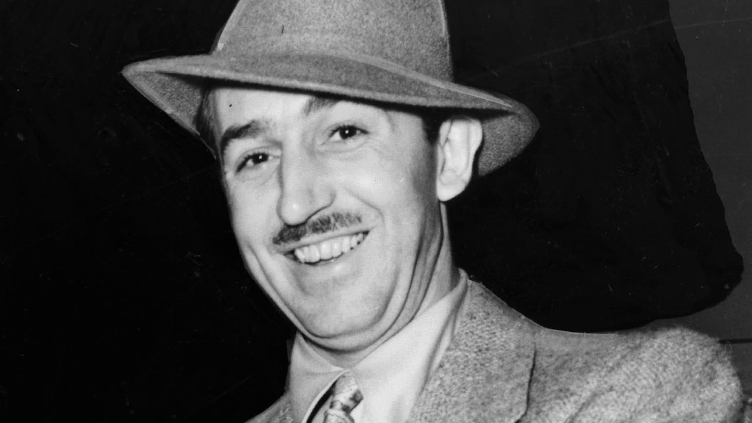 Walt Disney, cropped from photo of him shaking hands with Robert Taylor / World-Telegram photo by Alan Fisher.