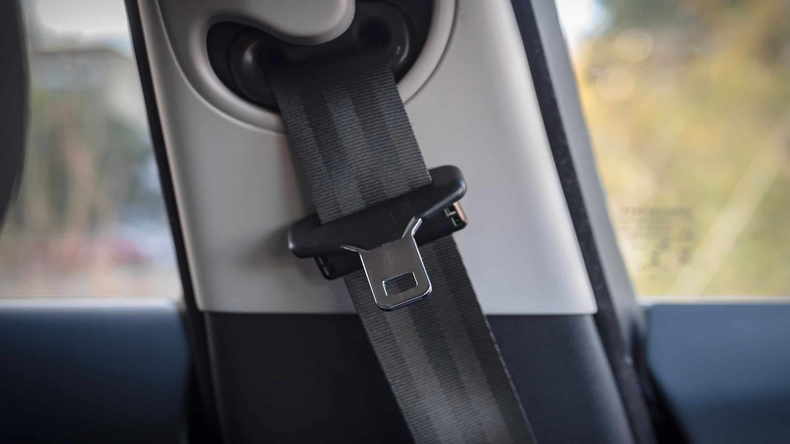 Car seat belt close up, Buckle and strap of a car seatbelt.