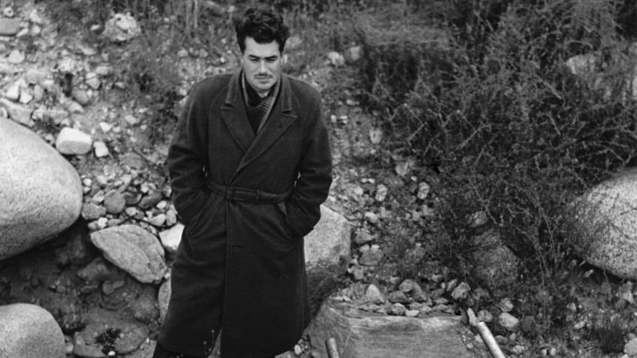 John Whiteside "Jack" Parsons standing above a Jet-Assisted Take Off canister at JPL's test site in the Arroyo Seco, Los Angeles County.