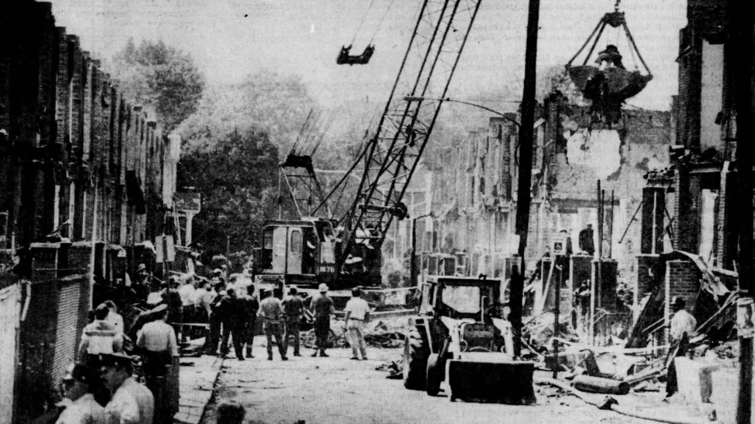 A crane removes debris at Osage Avenue after the 1985 MOVE bombing