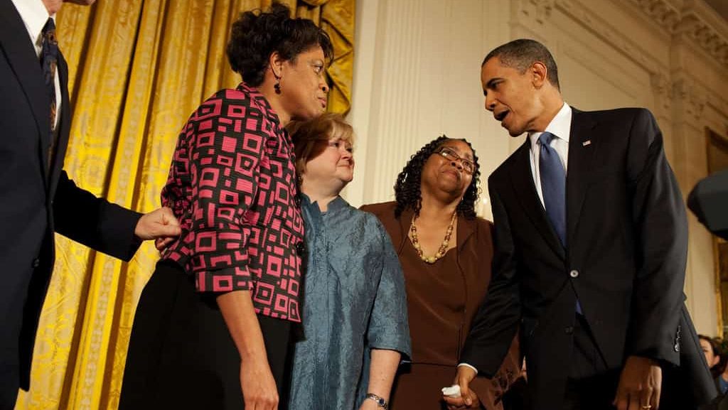 President Barack Obama greets Louvon Harris, left, Betty Byrd Boatner, right, both sisters of James Byrd, Jr., and Judy Shepard, center, mother of Matthew Shepard, following his remarks at a reception commemorating the enactment of the Matthew Shepard and James Byrd Jr. Hate Crimes Prevention Act, in the East Room, of the White House, October 28, 2009.