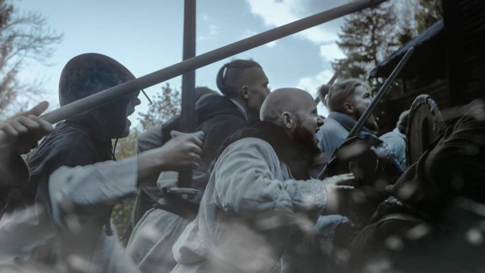 Large-scale,Medieval,Battle,Reenactment.,Violent,Tribe,Of,Warriors,Attack,Wooden