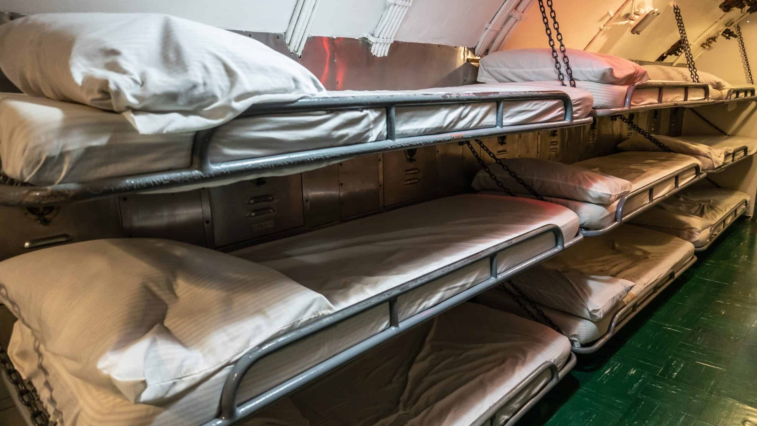 Oahu, Hawaii, USA. - January 10, 2020: Pearl Harbor. Sleeping quarter with hanging triple bunk beds in long submarine USS Bowfin.