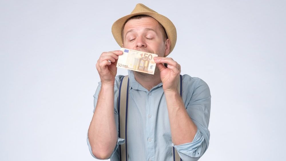 Man got cash money. Richness and wellbeing concept. Get cash money easy and quickly.