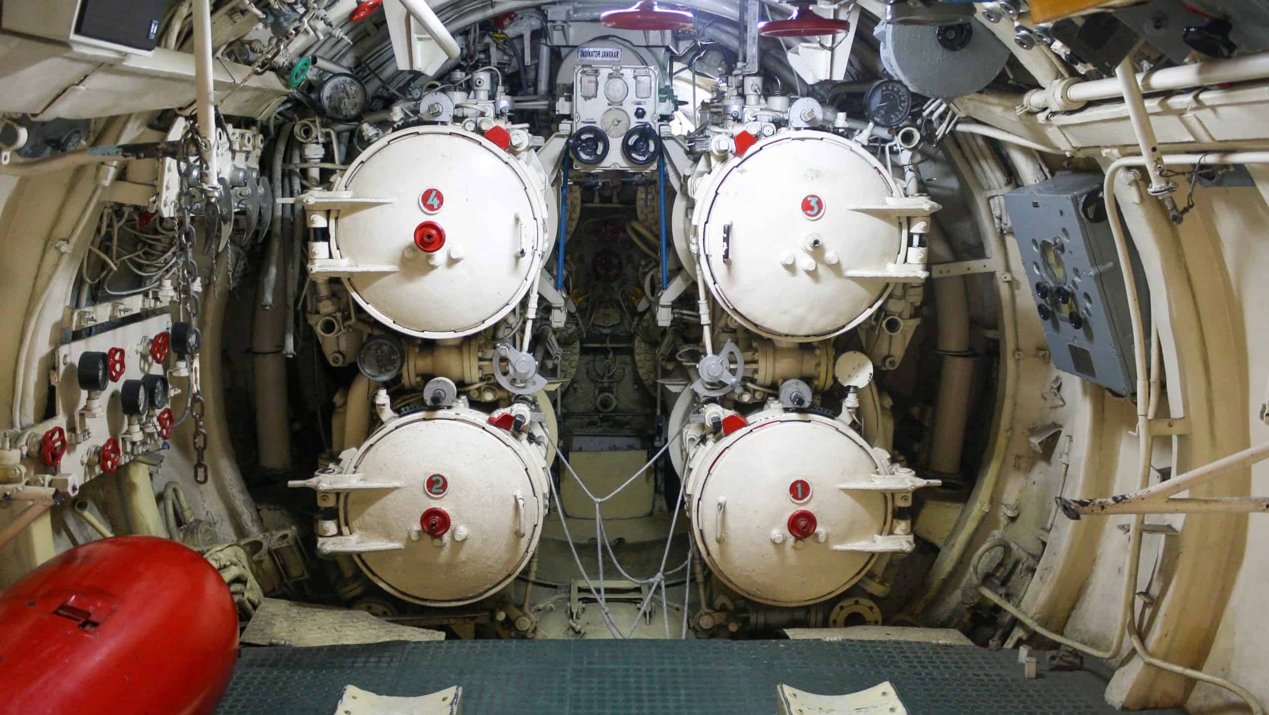 Surabaya, Indonesia - Dec 2010: View of torpedo tube launcher in old and retired Russian submarine museum Pasopati 410. No people.