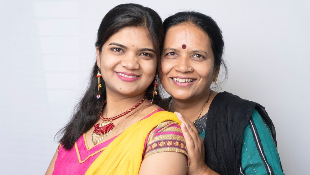 Portrait of indian beautiful mother and daughter.
