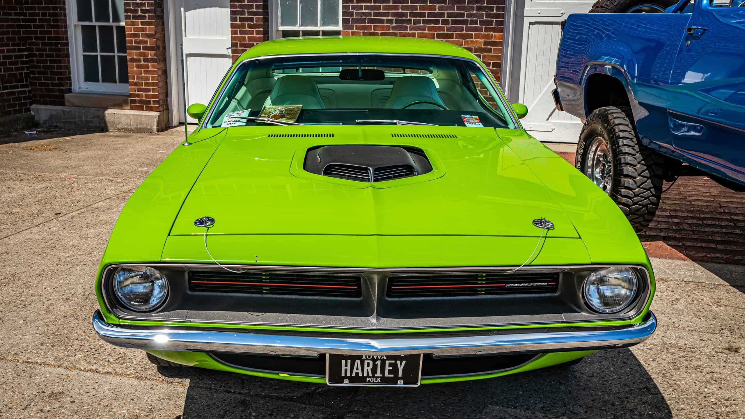 Des Moines, IA - July 03, 2022: High perspective front view of a 1970 Plymouth Hemi Cuda Hardtop Coupe at a local car show.