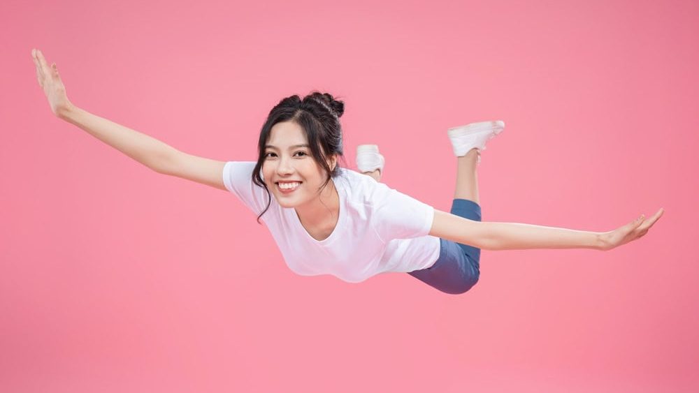 Young,Asian,Woman,On,Background