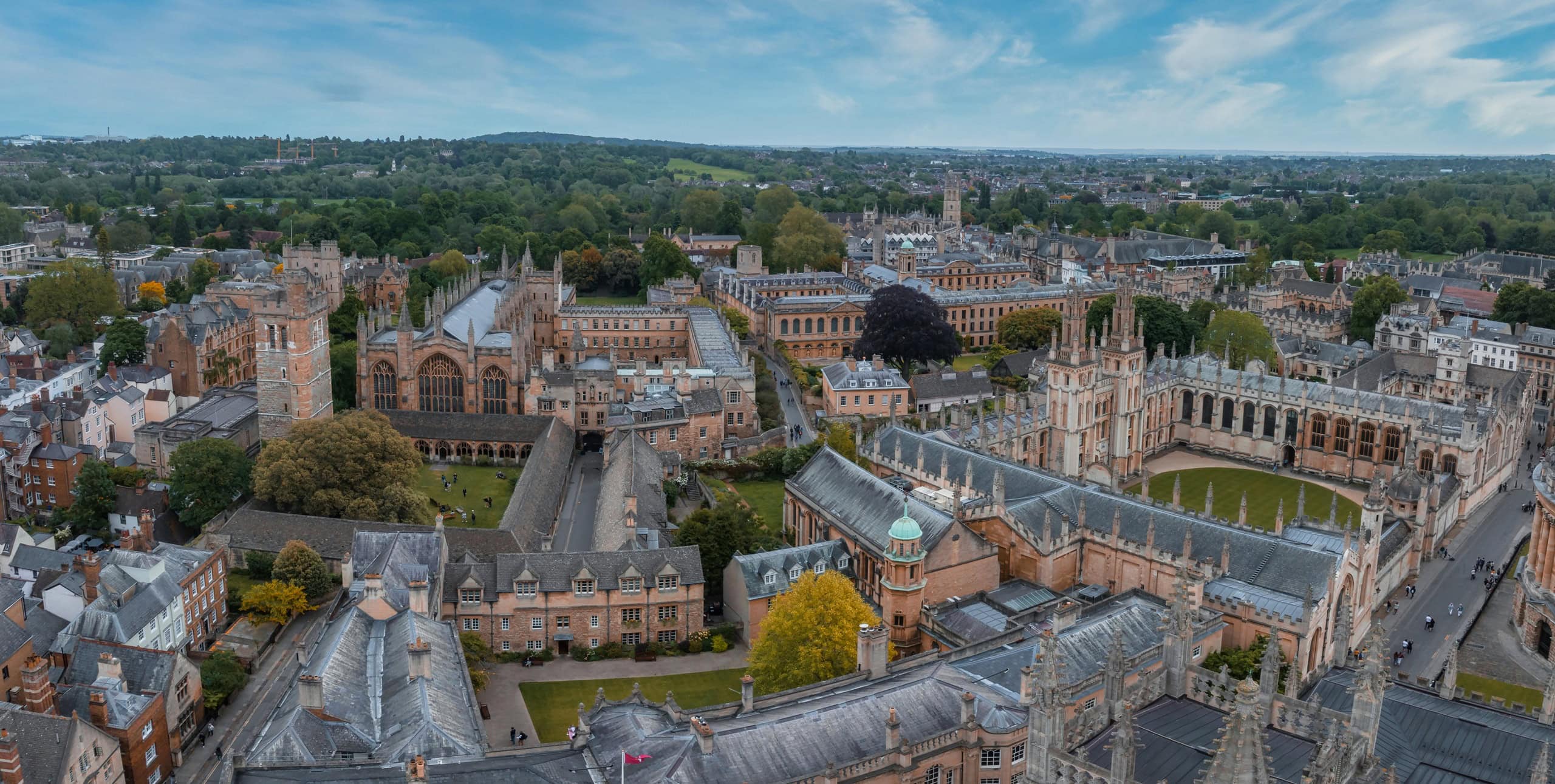 Aerial view of the Oxford city, UK. Beautiful medieval city with many castles and traditional English buildings.