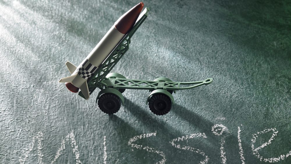 Plastic toy missile with carrier