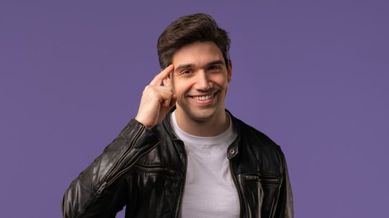 Handsome brainy man with gesture - you, think about it. Looking camera on violet. Thinking positive. Intelligent person with curly brunette hair. High quality