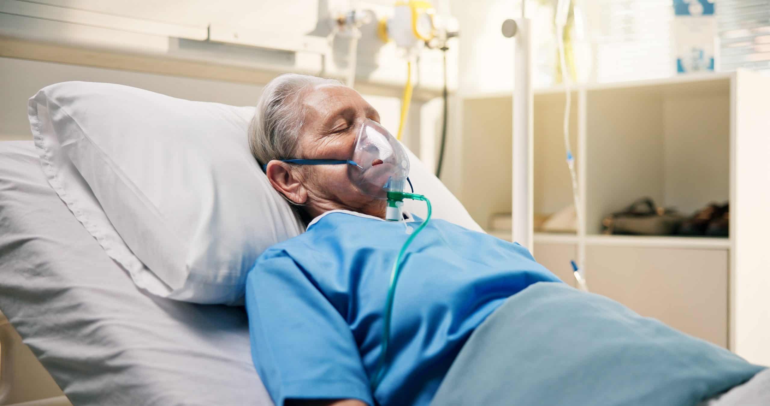 Oxygen,Mask,,Illness,And,Old,Woman,In,Hospital,Bed,,Healthcare