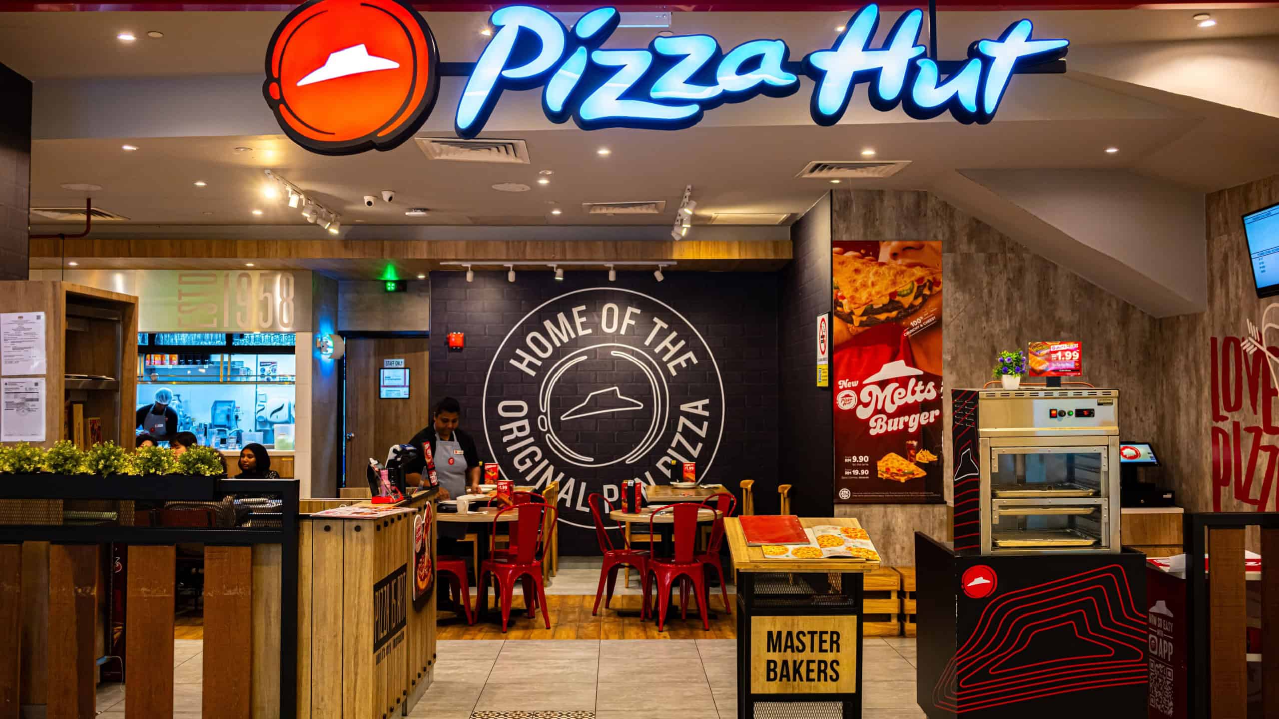 KUALA LUMPUR, MALAYSIA - MAY 29, 2025: Front entrance to Pizza Hut restaurant in Malaysia shopping mall.