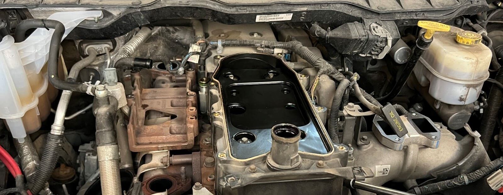 Engine repair in progress at Authentic Automotive. Expert automotive service for engine diagnostics.