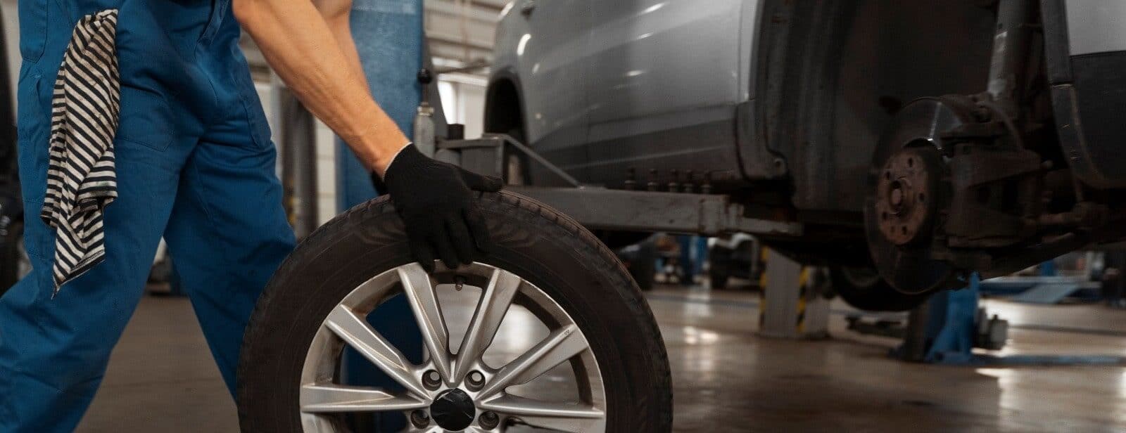 Tire replacement and wheel service at Auto Centers Service.