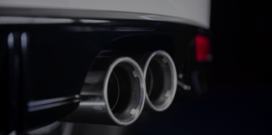 High-performance exhaust system with dual mufflers for enhanced sound and efficiency.