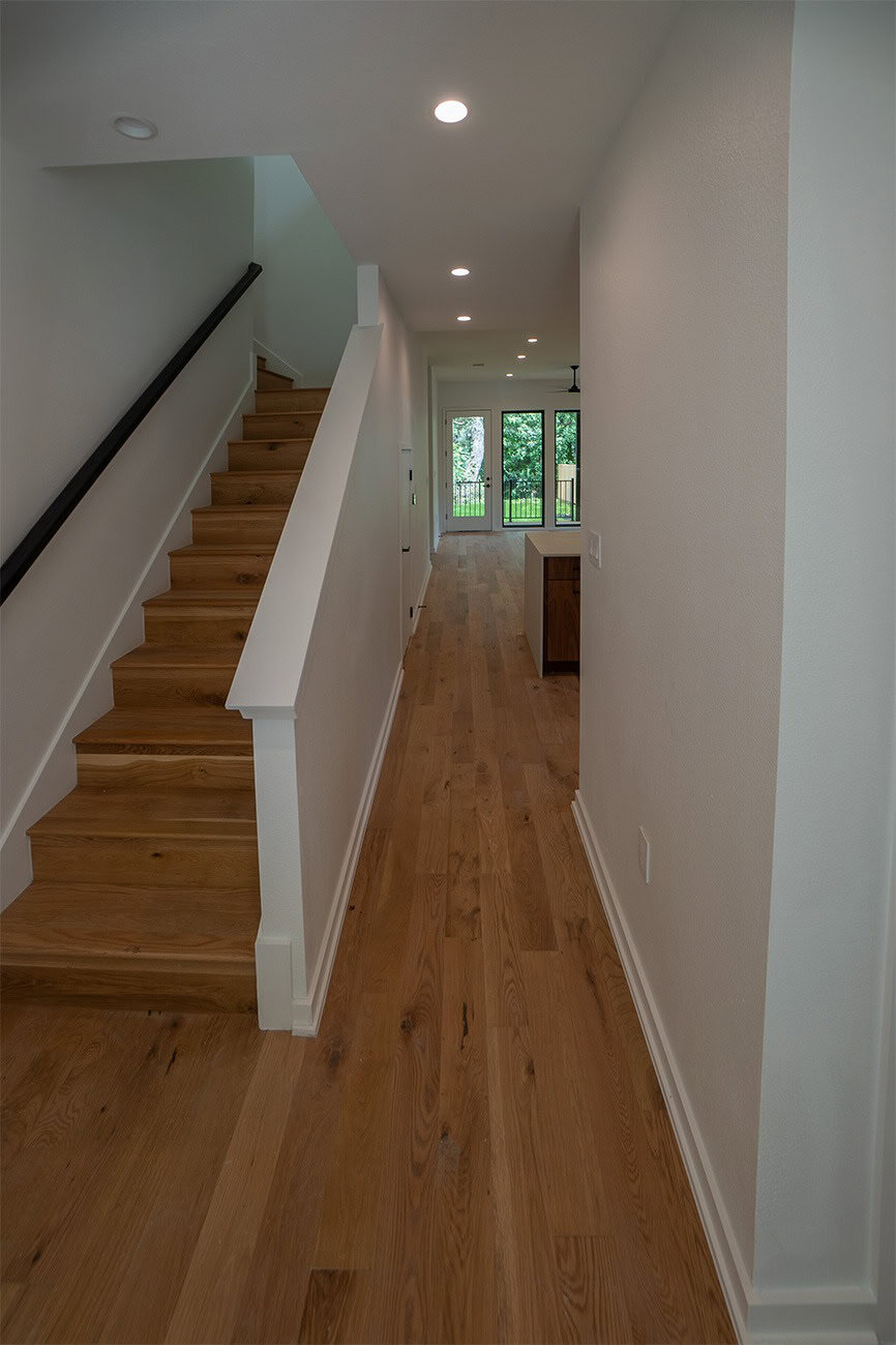 hardwood floor | Baker Flooring & Design Logo