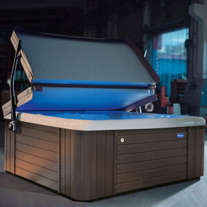 A luxurious hot tub with a blue cover