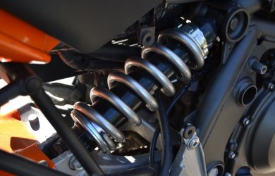 High-quality motorcycle suspension with coil spring for smooth rides.