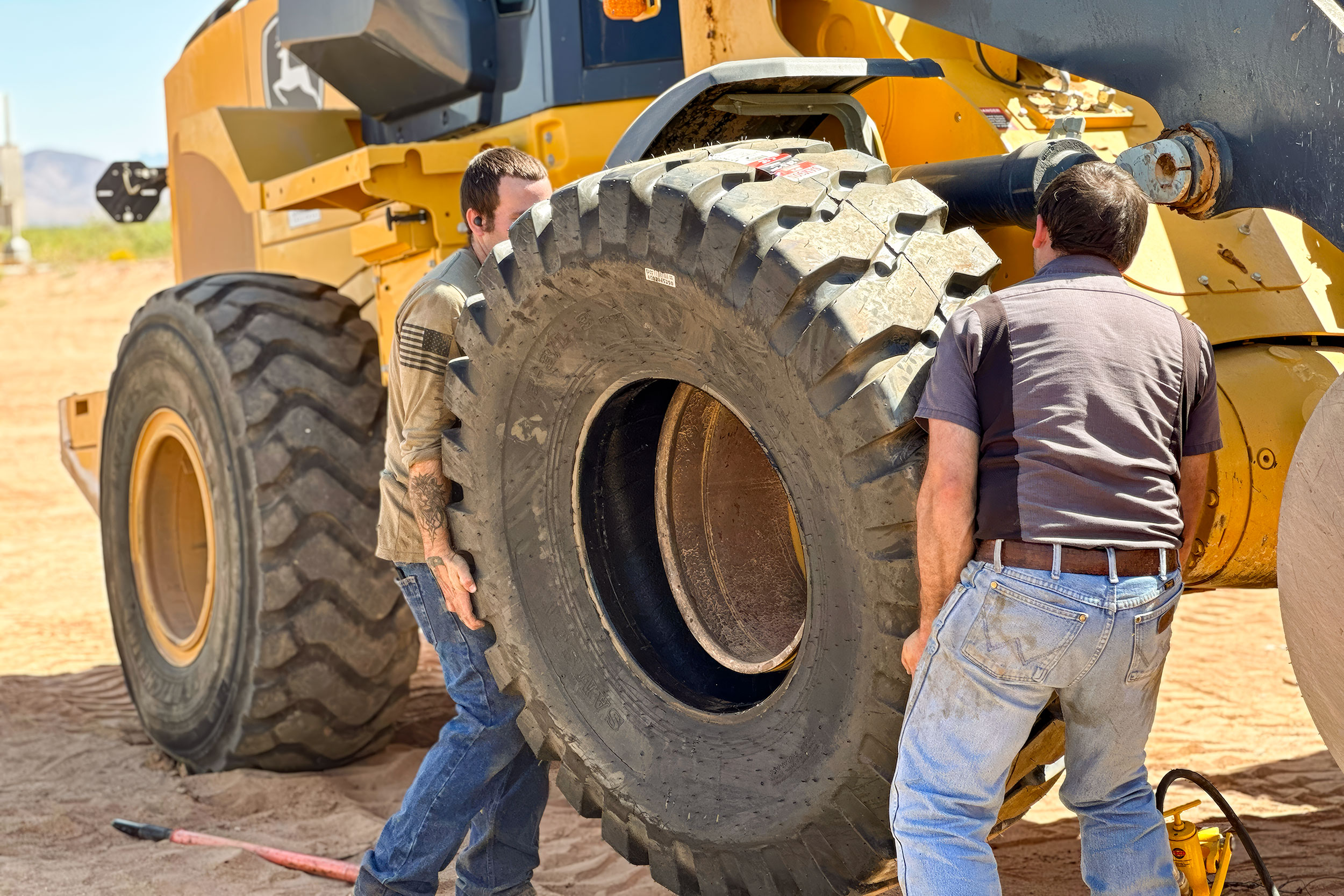 Heavy machinery tire repair service.