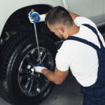 Professional tire repair on heavy equipment at Big Sky Tire and Repair.