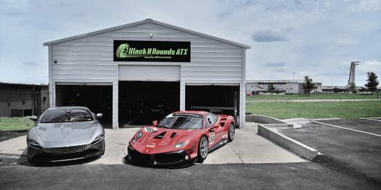 Modern car showroom with luxury vehicles at Black n Rounds ATX in Austin, TX.