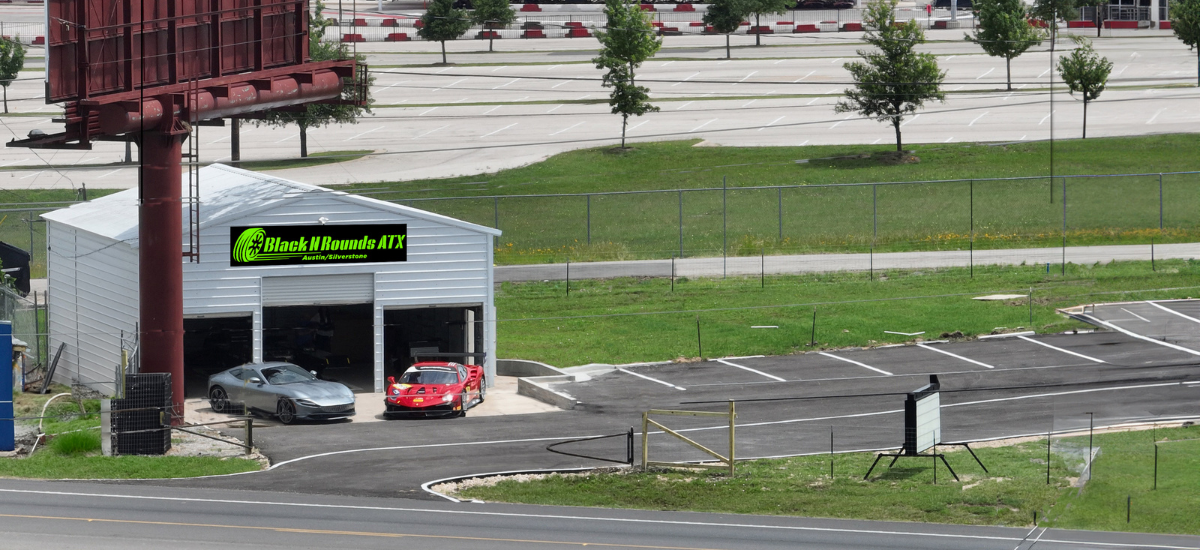 Black n Rounds ATX tire shop with cars in service bay.