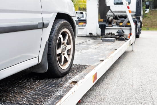 Auto towing and roadside assistance in progress at Blas Auto Service.