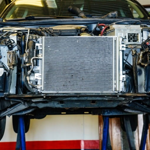 Engine cooling system radiator in a vehicle under repair at Boise Muffler Auto Repair.