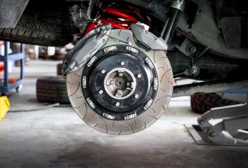 Brake disc being serviced on a vehicle at Butterworth's Service Centre.
