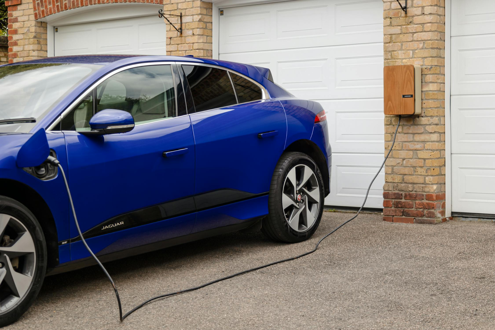 Electric vehicle being charged at Butterworth's Service Centre.