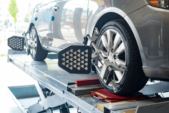 Wheel alignment being performed on a modern vehicle at C&D Automotive.