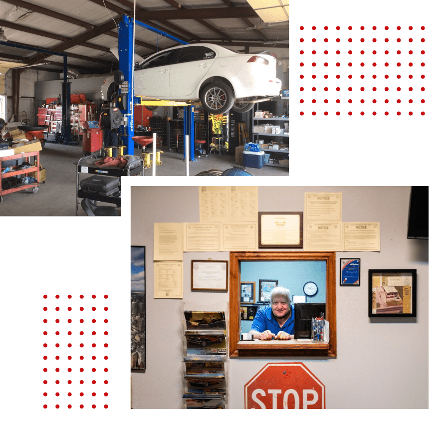 Auto repair shop with car on lift and friendly staff at C&D Automotive.