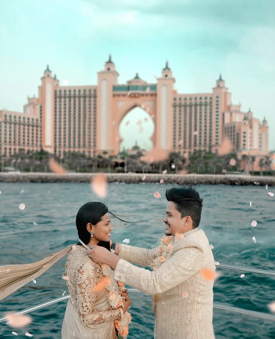 Couple getting married on a yacht wearing Indian Traditional Sherwani and Saree in Arabian Sea blu 1 1 1