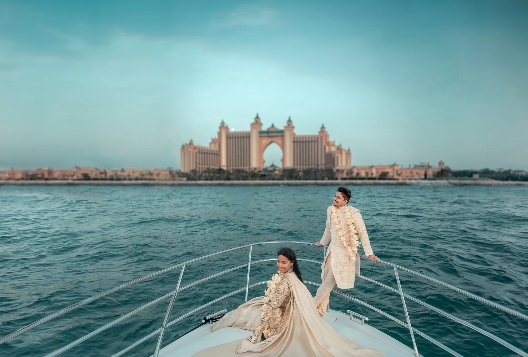 Couple getting married on a yacht wearing Indian Traditional Sherwani and Saree in Arabian Sea blu 1 1 1