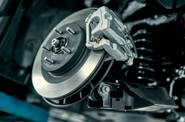 Car brake disc and caliper repair at Capitol Auto Service, expert auto maintenance.