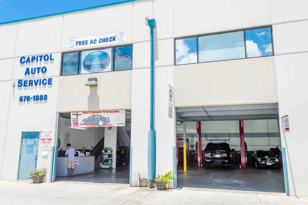 Auto repair shop with service bays and customer area in Capitol.