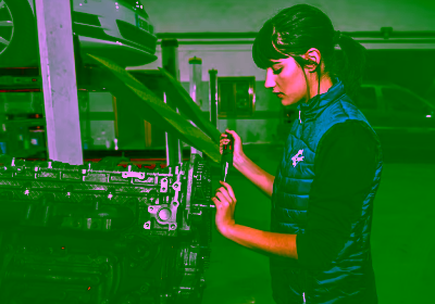 young-female-mechanic-working-repair-car-engine_545448-16541.avif