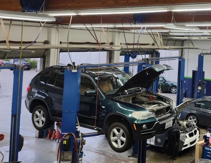 Vehicle on lift during auto repair at Catalpa Street Garage.