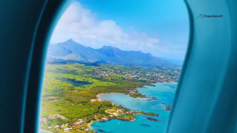 airplane window looking at an island