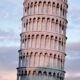 Iconic Leaning Tower of Pisa in Italy with architectural details.