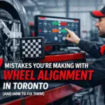 Auto technician performing wheel alignment on a vehicle at Cochrane Auto Repair.