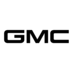 GMC truck parked at Country Tires & More, showcasing tire and automotive services in a rural setting.