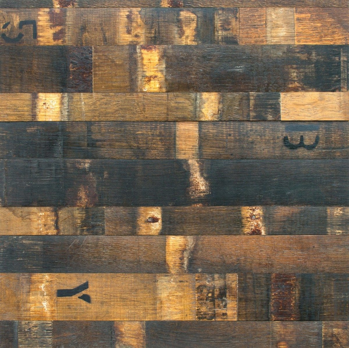 Reclaimed hardwood flooring with a rustic, weathered finish, perfect for custom flooring projects and interior design.