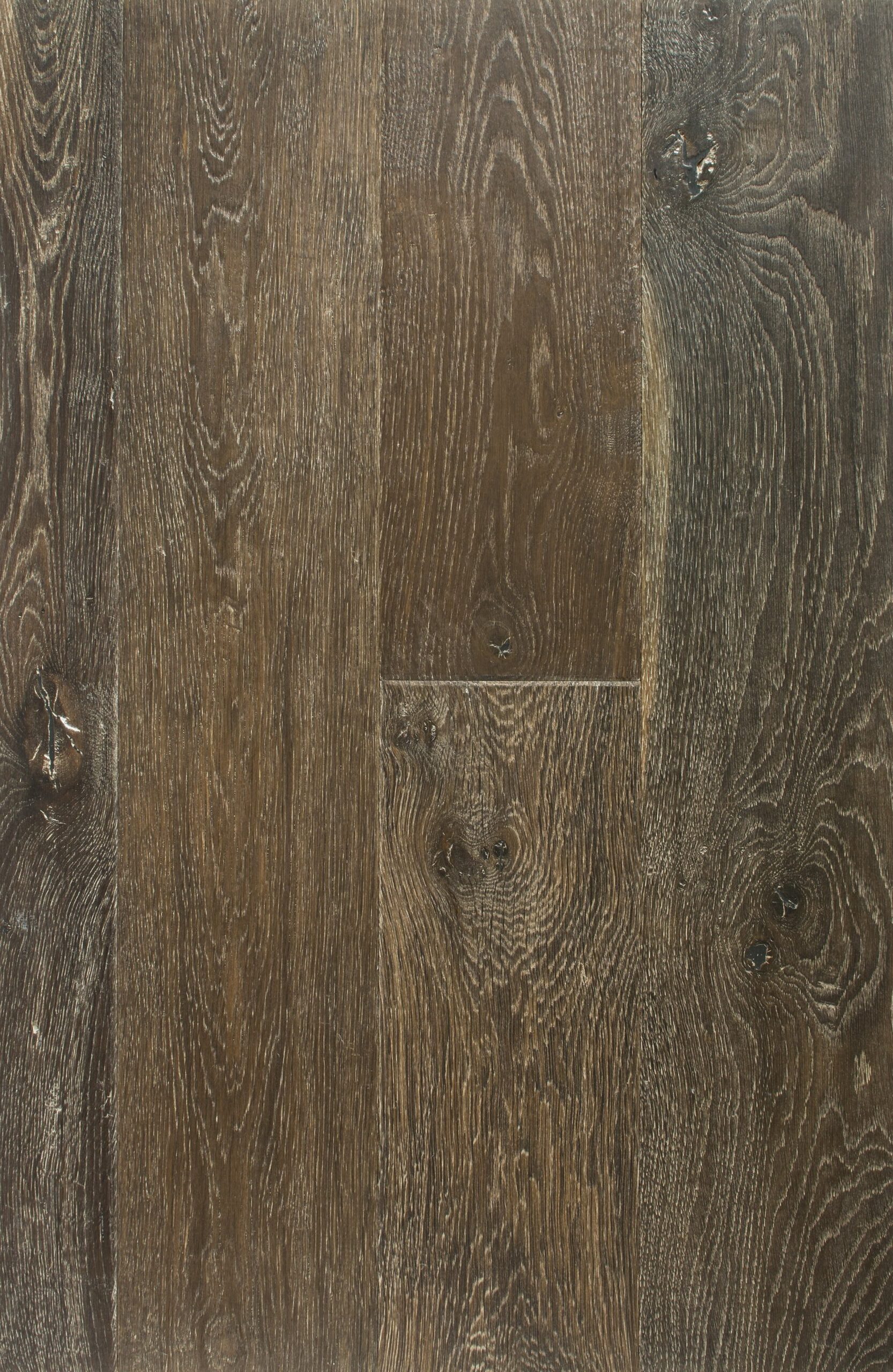 Rich brown hardwood flooring with visible wood grain and knots, ideal for stylish home flooring solutions.