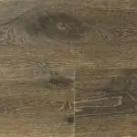 Warm wood flooring with natural grain and knots, perfect for interior home designs.
