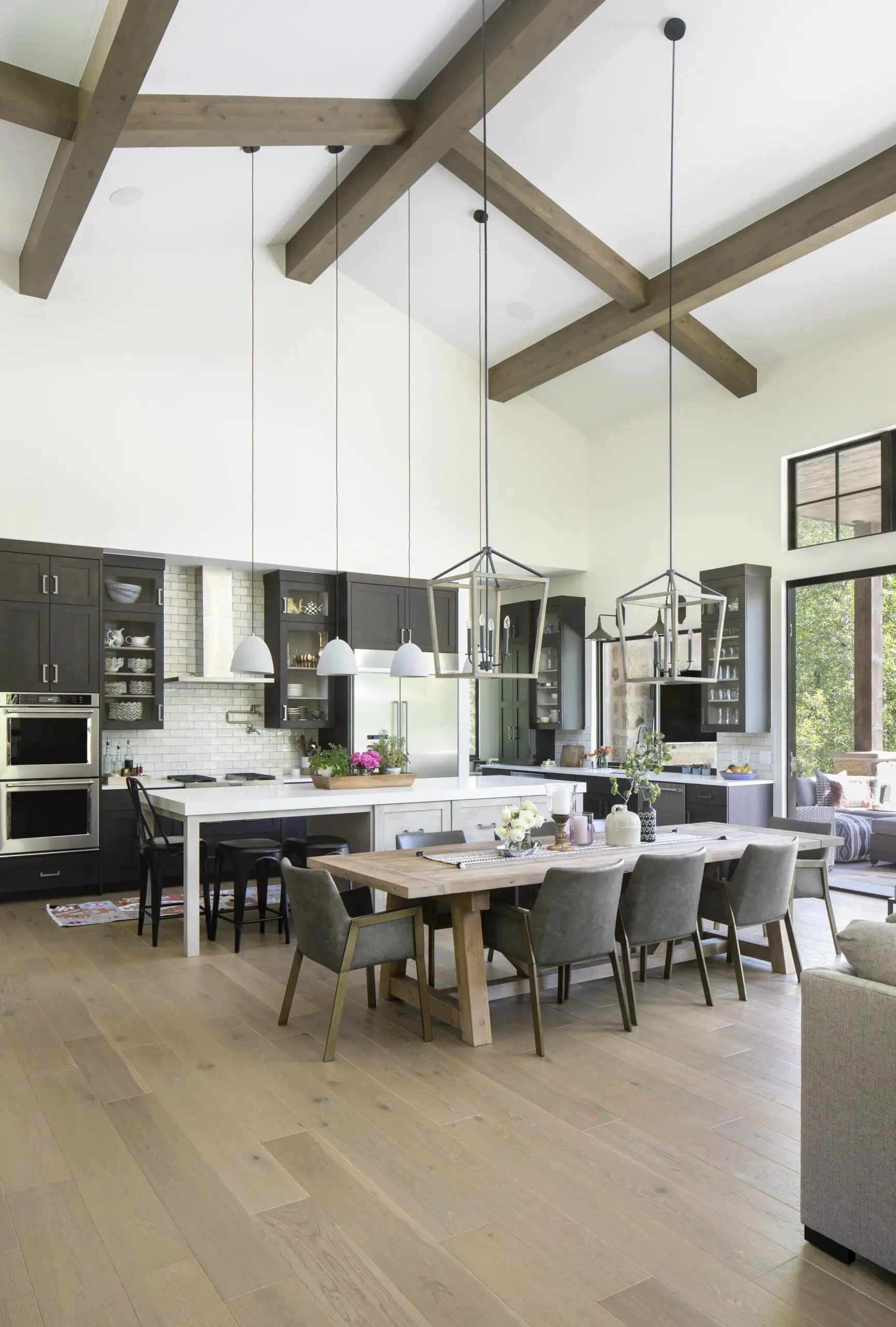 Smooth light oak hardwood flooring in modern kitchen and dining area.