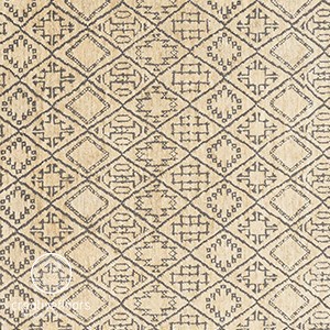 Intricate beige and brown patterned area rug with geometric design - ideal for stylish interior spaces.