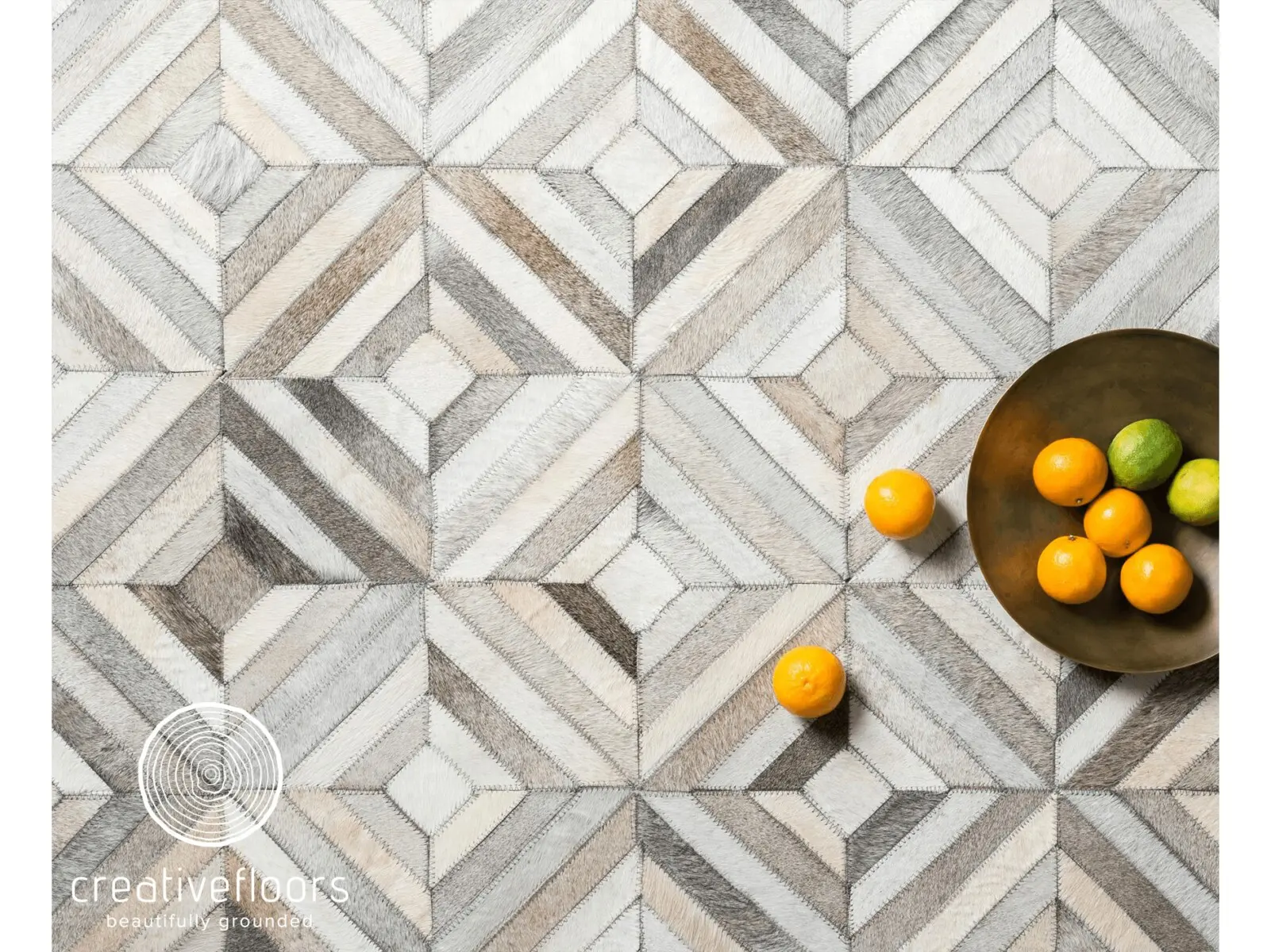 Vrayse natural geometric fiber rug with neutral tones, modern and stylish floor decor.